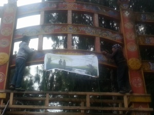 Banner announcing registration for Sherubtse Film Awards 2014 being hung on the College's main gate